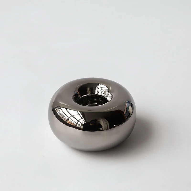 Elegant Silver Candle Holder with Minimalist Design